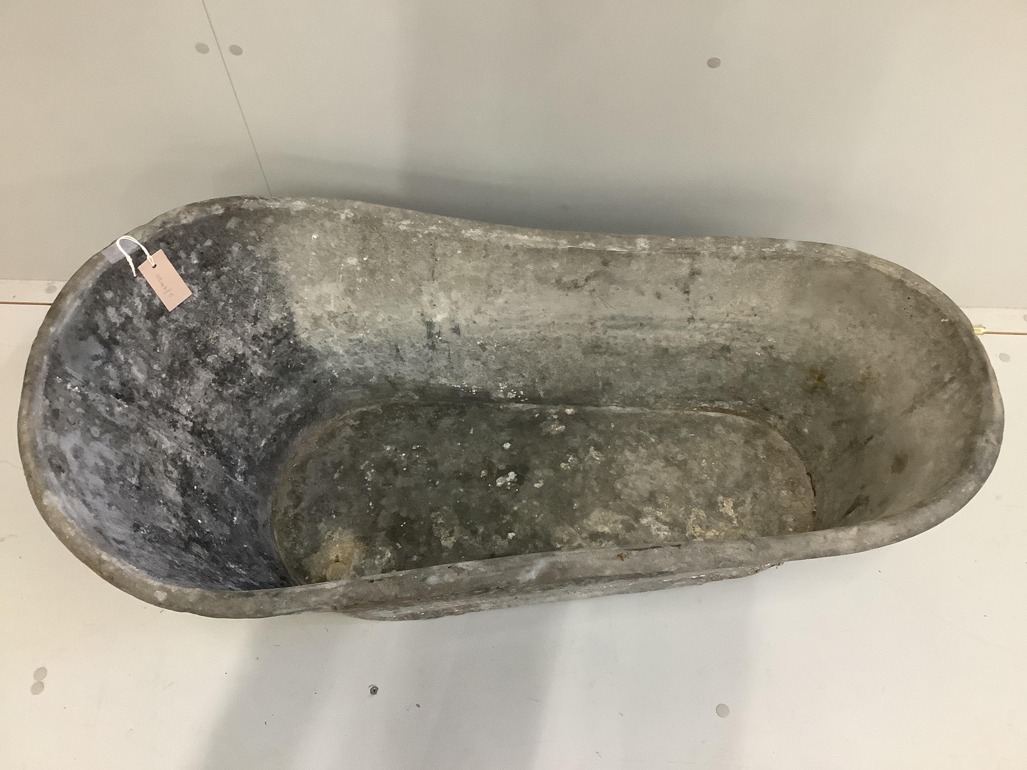 A vintage French galvanised child's bath, length 103cm, height 42cm